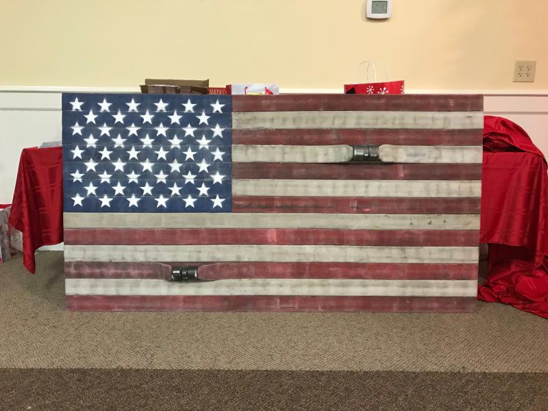 American Flag made out of retired fire hose
